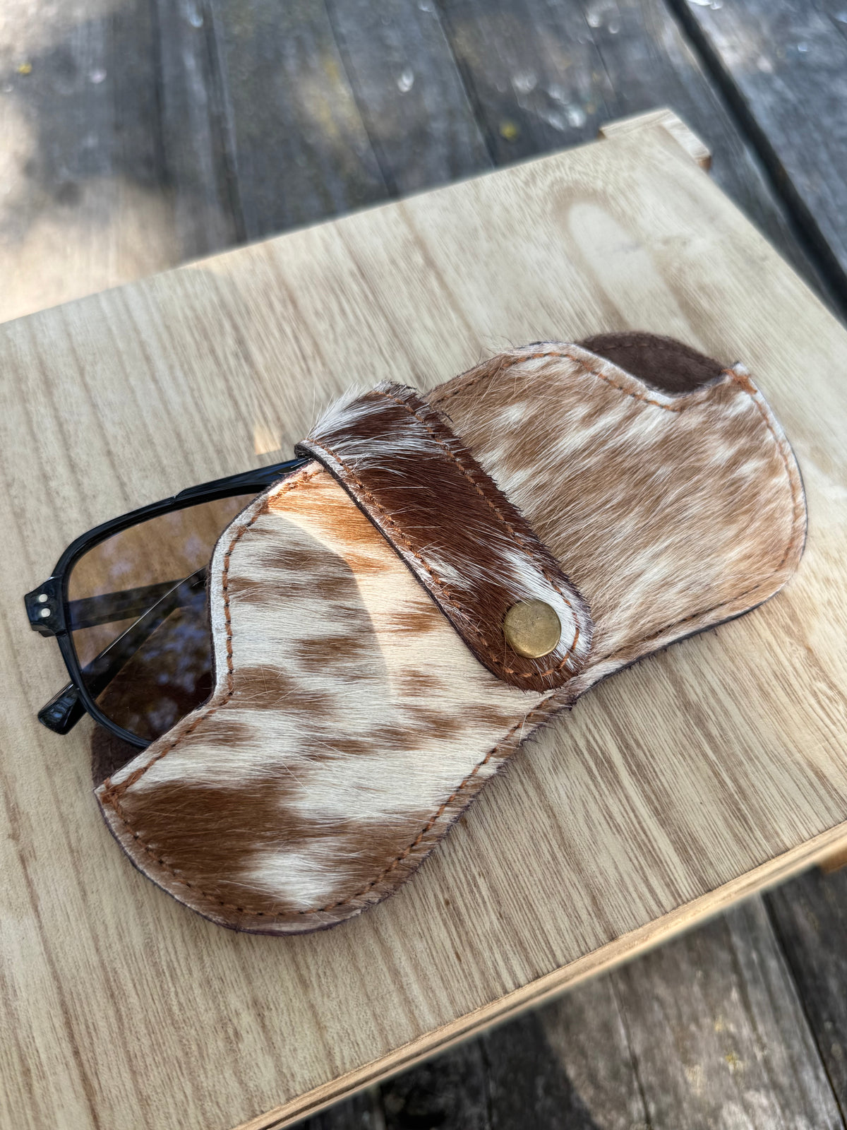 Cowhide sunny holder